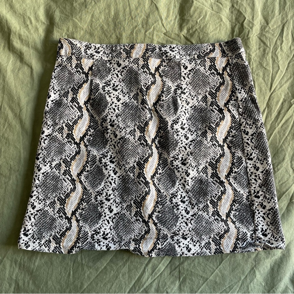 Ivory snakeskin print mini skirt